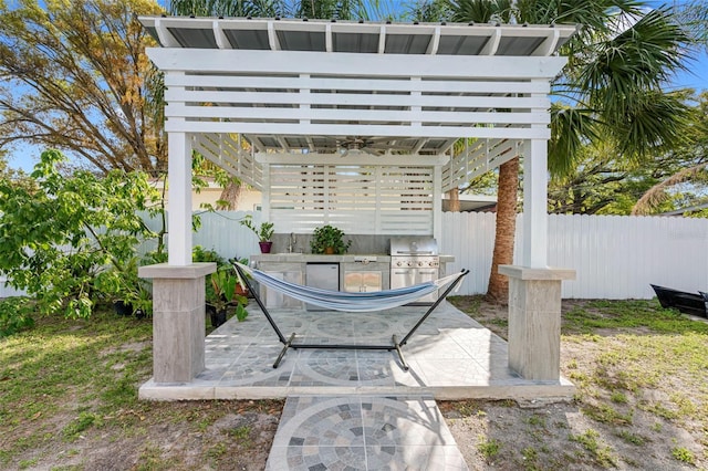 view of patio / terrace featuring a pergola and area for grilling