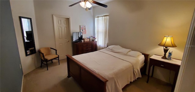 bedroom with dark carpet and ceiling fan