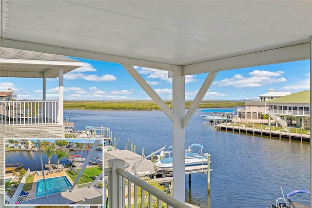 dock area with a water view