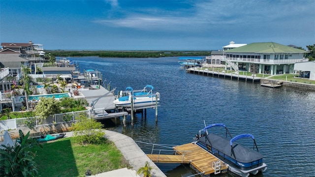 dock area featuring a water view