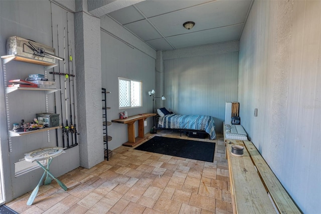 bedroom with a drop ceiling