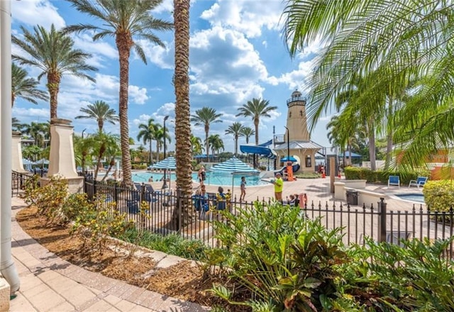 exterior space featuring a water slide and a patio