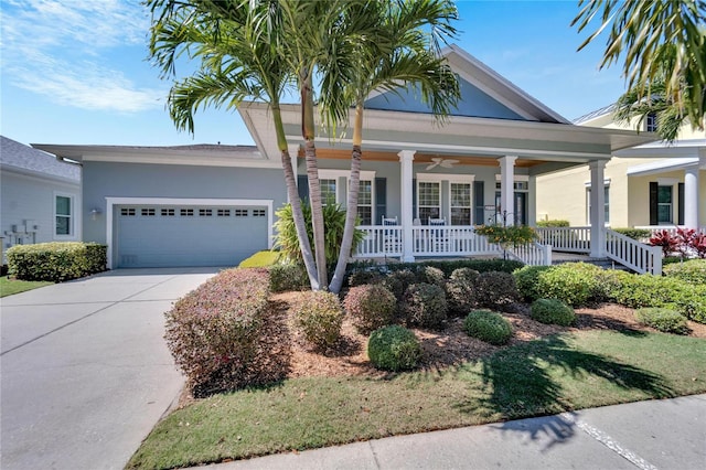 view of front of home featuring a garage and a porch