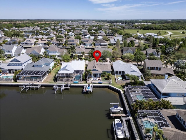 drone / aerial view with a water view