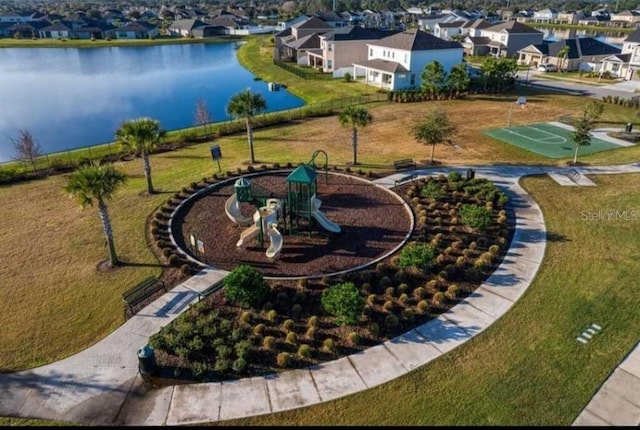 drone / aerial view with a water view