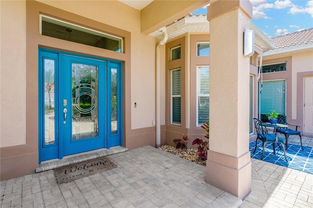 property entrance featuring french doors