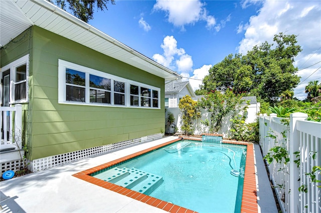 view of pool featuring a patio area