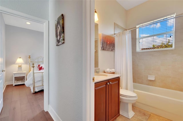 full bathroom featuring vanity, shower / tub combo with curtain, hardwood / wood-style floors, and toilet