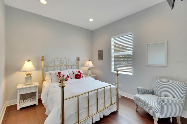 bedroom featuring dark hardwood / wood-style floors