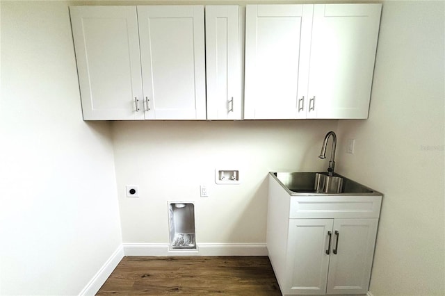 laundry room with washer hookup, sink, dark hardwood / wood-style flooring, electric dryer hookup, and cabinets