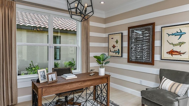 office space featuring a chandelier, light hardwood / wood-style flooring, and crown molding