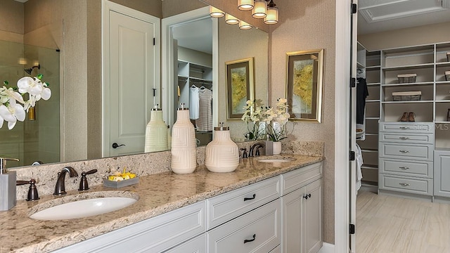 bathroom with dual bowl vanity