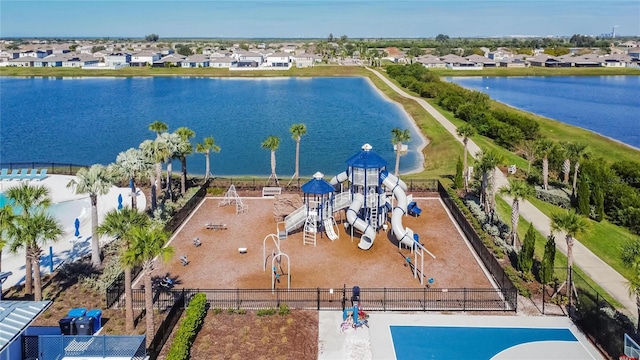 aerial view featuring a residential view and a water view