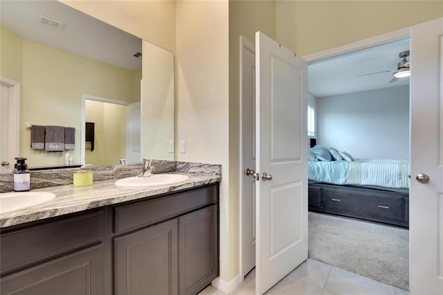 full bathroom with a sink, double vanity, ensuite bath, and visible vents