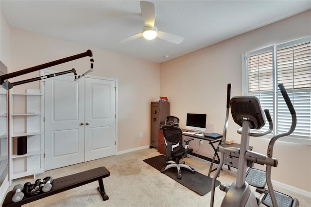 home office with carpet, baseboards, and ceiling fan