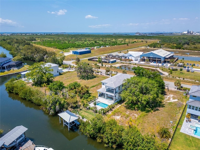 bird's eye view with a water view