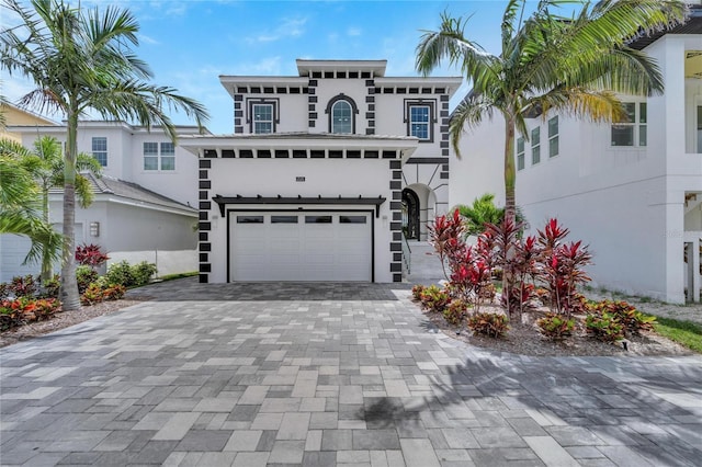 view of front of home with a garage