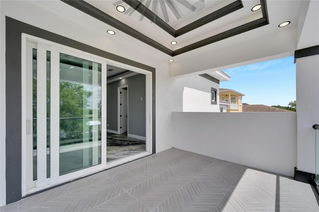 exterior space featuring a tray ceiling