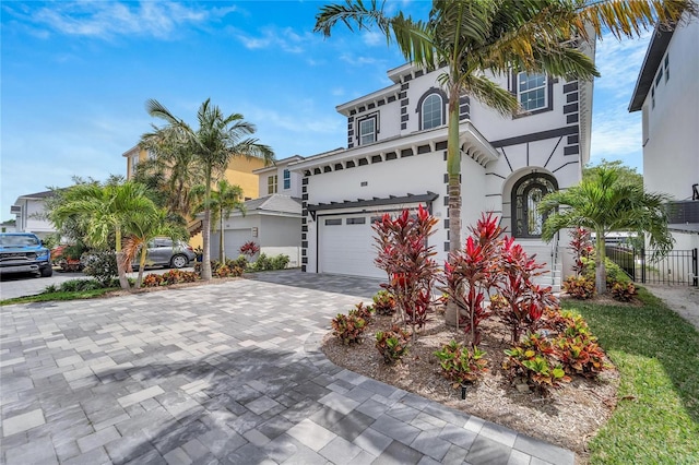 view of front of property with a garage