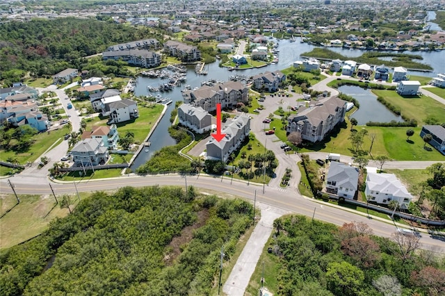 bird's eye view with a water view