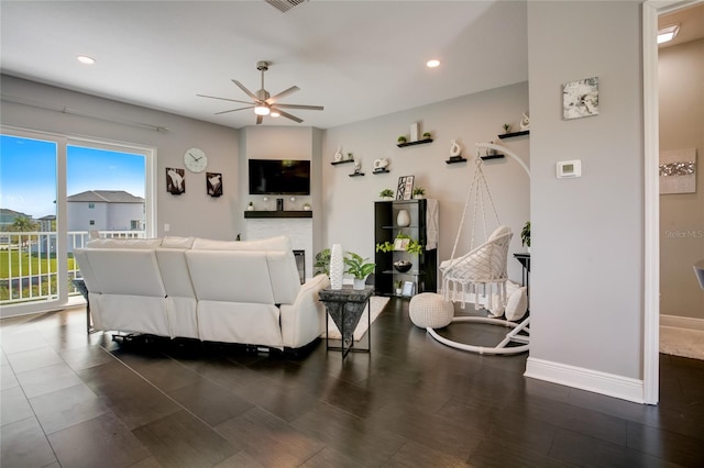 living room with ceiling fan