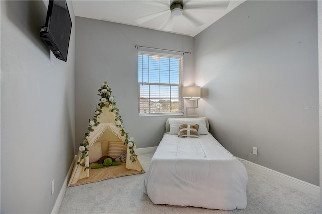 bedroom with light colored carpet and ceiling fan