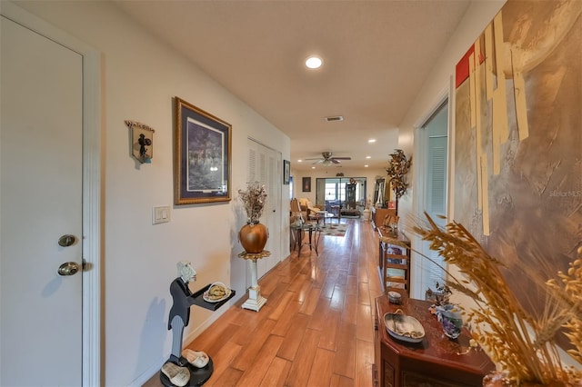 hallway featuring light hardwood / wood-style flooring