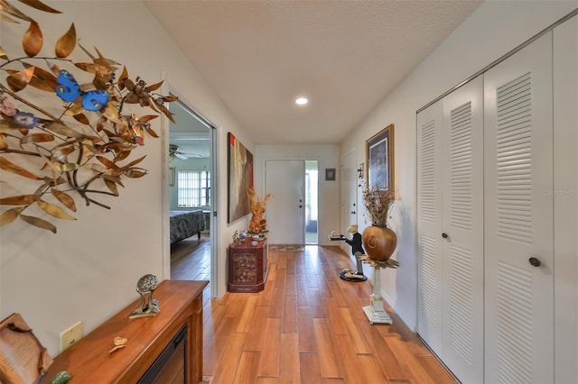 hallway featuring light wood-type flooring