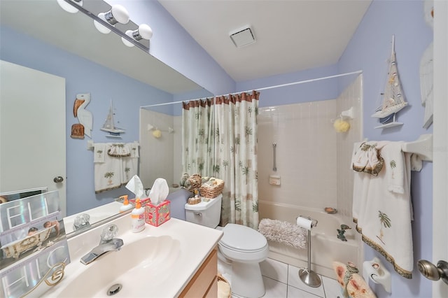 full bathroom with tile patterned floors, vanity, shower / tub combo, and toilet