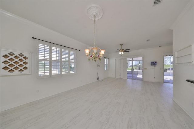 spare room with ornamental molding, ceiling fan with notable chandelier, and light wood-type flooring