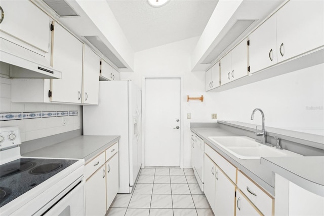 kitchen with white cabinetry, sink, vaulted ceiling, white appliances, and light tile patterned flooring