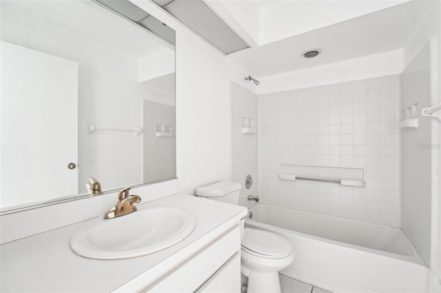 full bathroom with tile patterned flooring, vanity, toilet, and tiled shower / bath combo