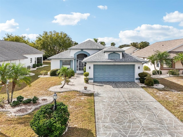 view of front of property with a garage