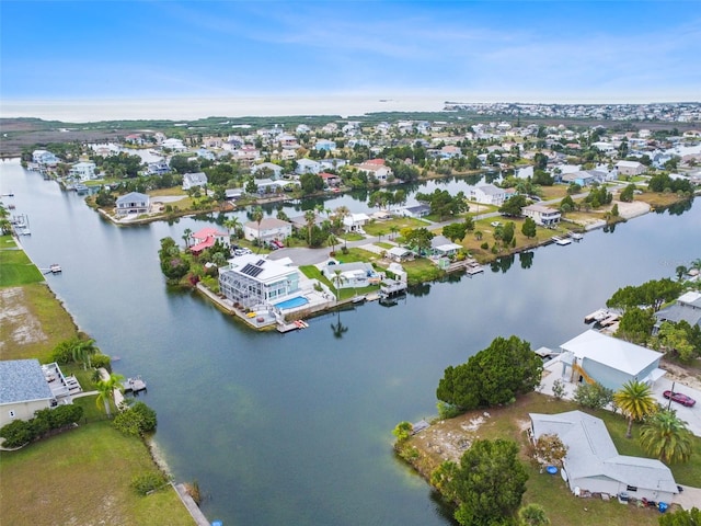 aerial view featuring a water view and a residential view