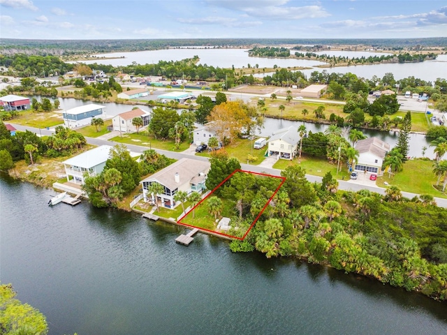 bird's eye view with a water view and a residential view