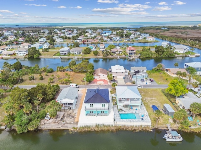 3380 Holly Springs Dr, Hernando Beach, FL 34607 - aerial perspective of suburban area featuring a large body of water