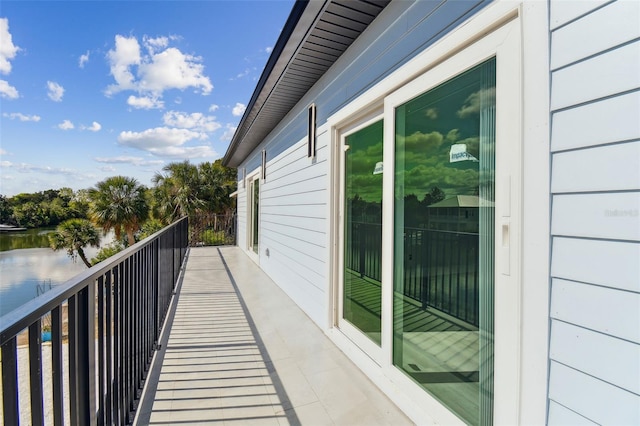 3380 Holly Springs Dr, Hernando Beach, FL 34607 - balcony featuring a water view