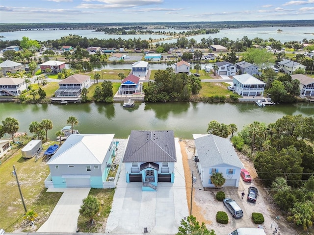 3380 Holly Springs Dr, Hernando Beach, FL 34607 - aerial perspective of suburban area featuring a nearby body of water