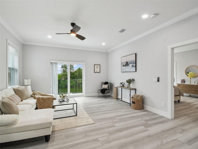 3380 Holly Springs Dr, Hernando Beach, FL 34607 - living area featuring plenty of natural light, a ceiling fan, crown molding, light wood-style flooring, and recessed lighting