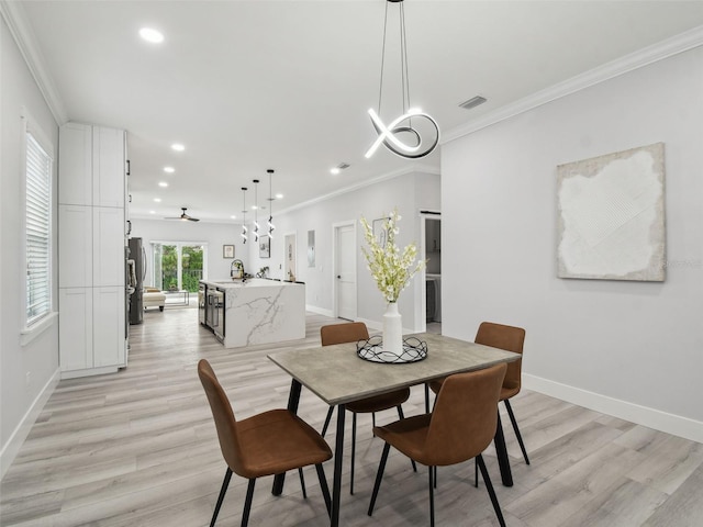 3380 Holly Springs Dr, Hernando Beach, FL 34607 - dining area with recessed lighting, light wood-style floors, ornamental molding, and ceiling fan