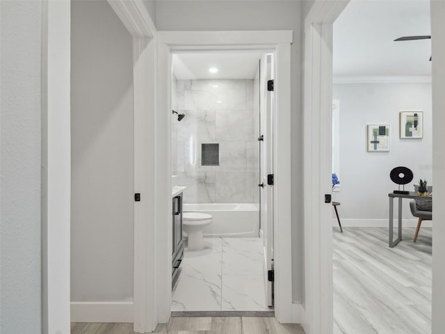 3380 Holly Springs Dr, Hernando Beach, FL 34607 - bathroom featuring ornamental molding, vanity, marble finish flooring, and bathing tub / shower combination