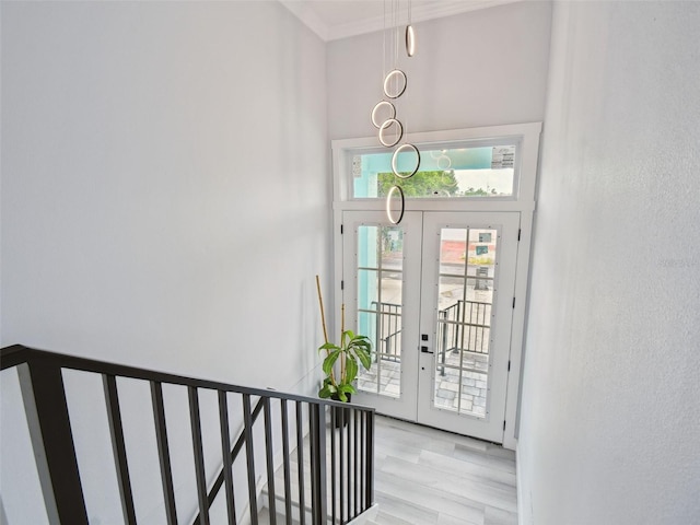 3380 Holly Springs Dr, Hernando Beach, FL 34607 - entrance foyer with french doors and light wood-type flooring