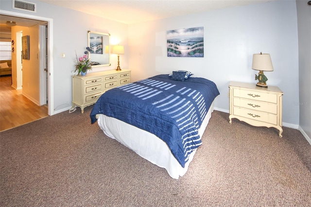 bedroom featuring carpet