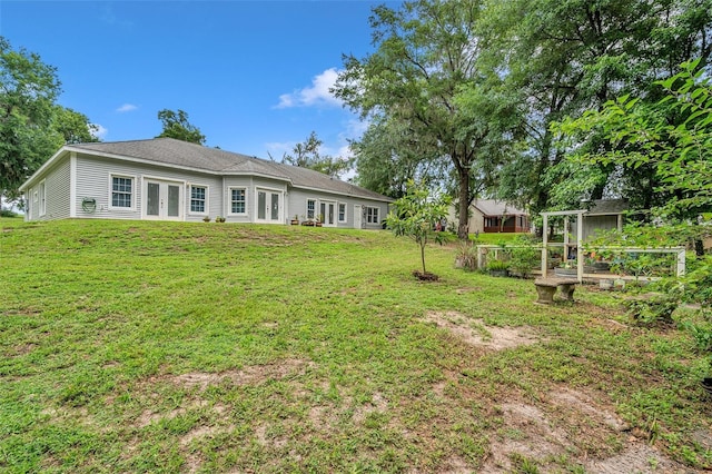 view of yard featuring french doors