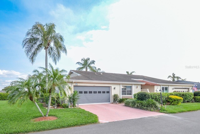 ranch-style home with a garage