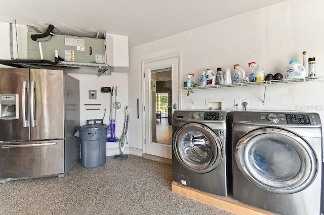 laundry room with hookup for a washing machine and independent washer and dryer