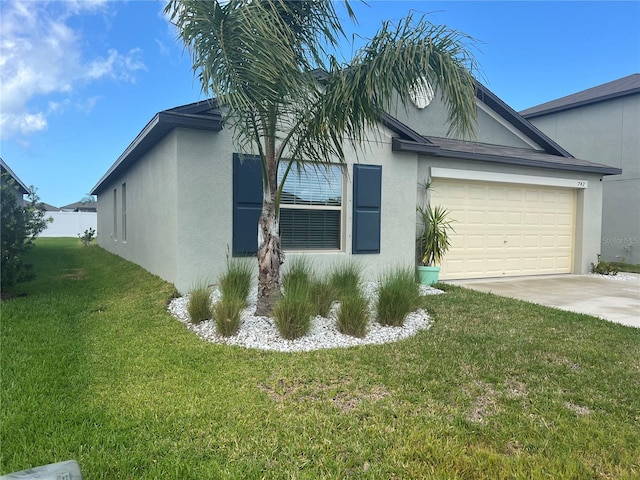 exterior space with a front lawn and a garage