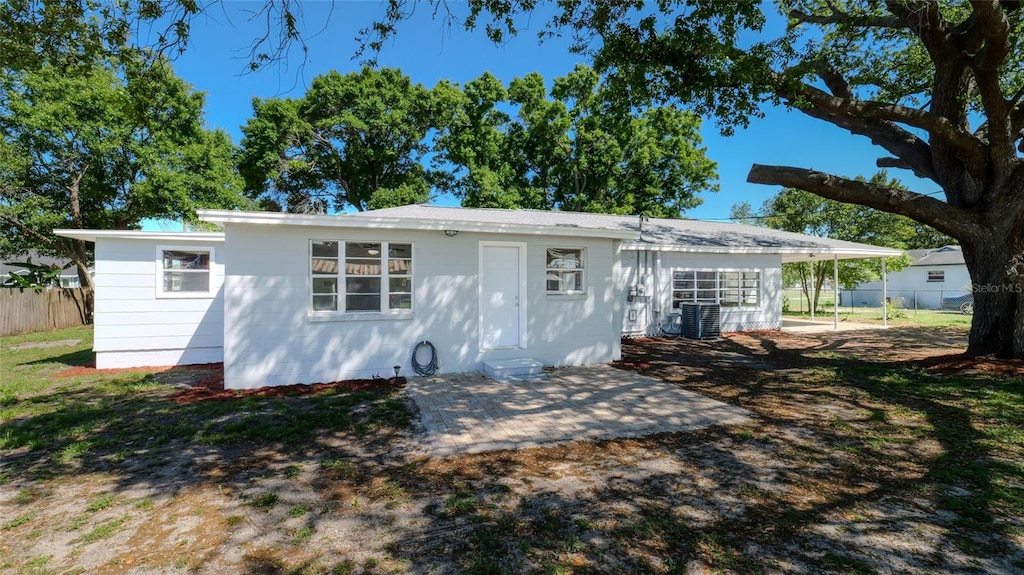 single story home with a patio and central AC