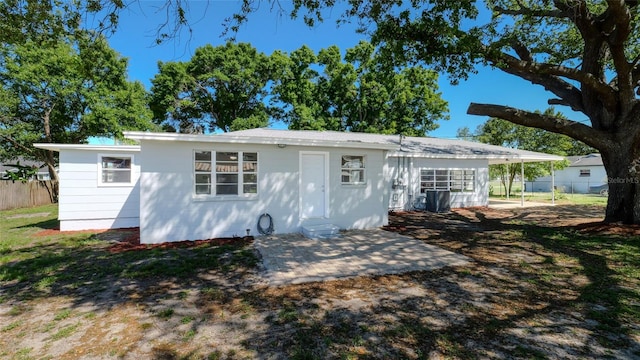 single story home with a patio and central AC