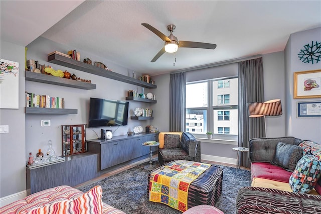 living room with ceiling fan